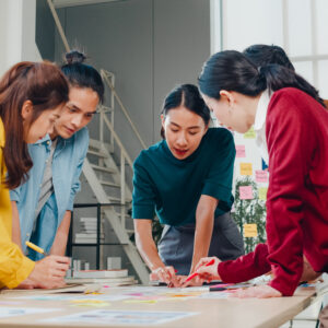 asian businessmen and businesswomen meeting brainstorming ideas